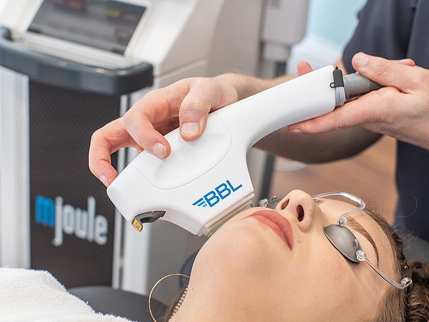 Spa-like room with towels and modern decor.