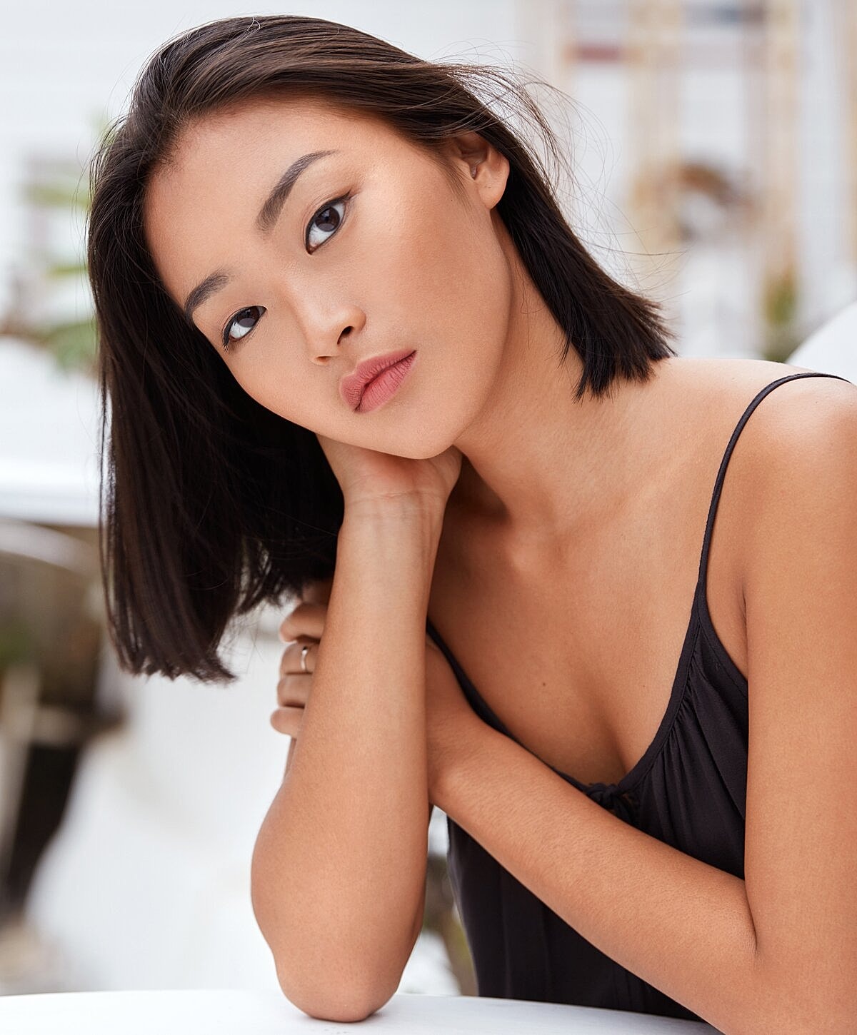 Smiling woman with long, light brown hair.