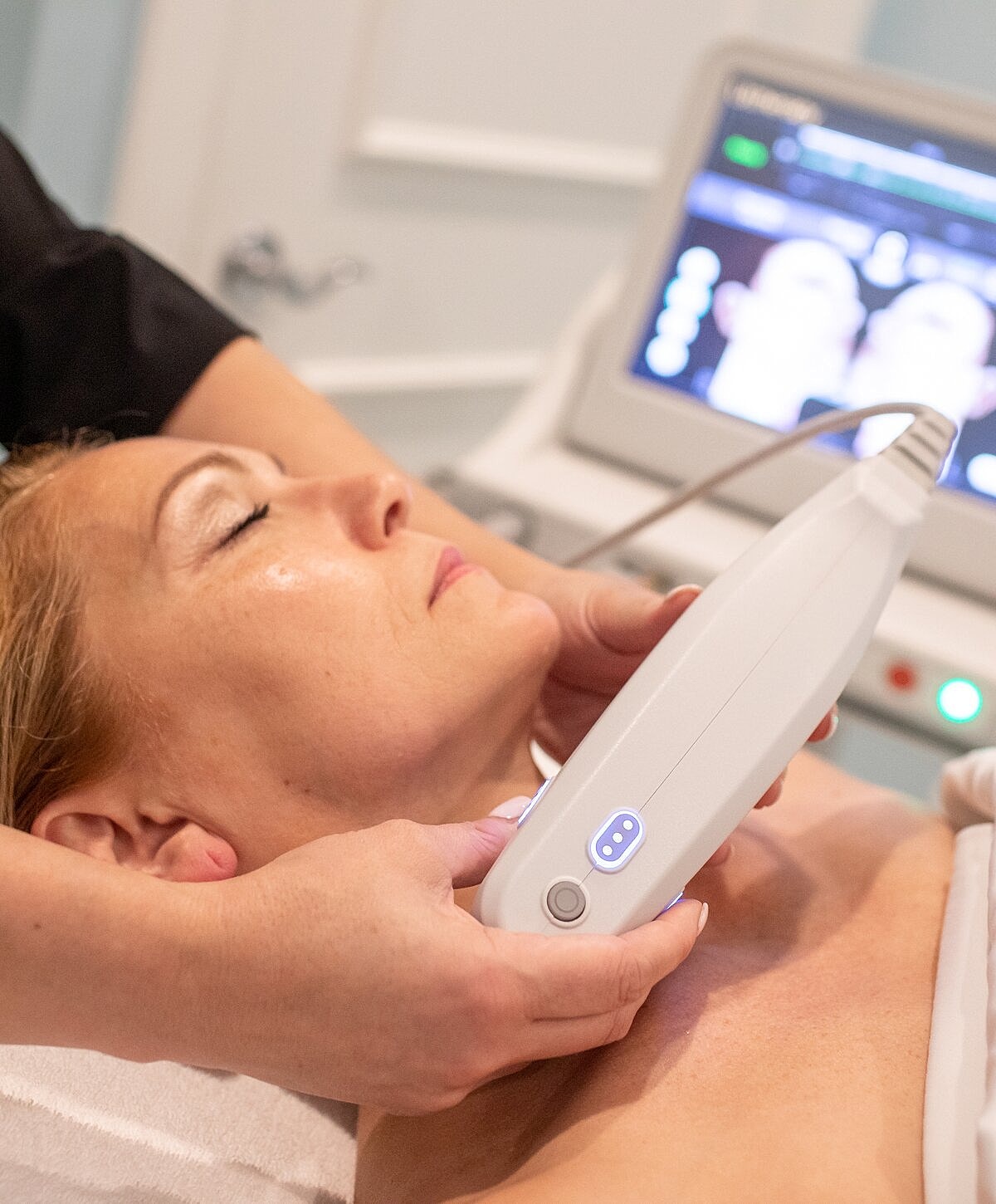 Smiling woman with long, light brown hair.